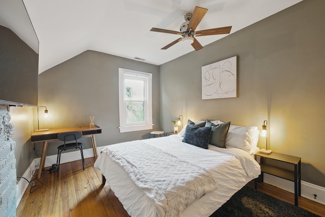 420 Stanley Ave, Columbus, OH 43206 - bedroom with hardwood / wood-style floors, an office area, vaulted ceiling, baseboards, and a ceiling fan