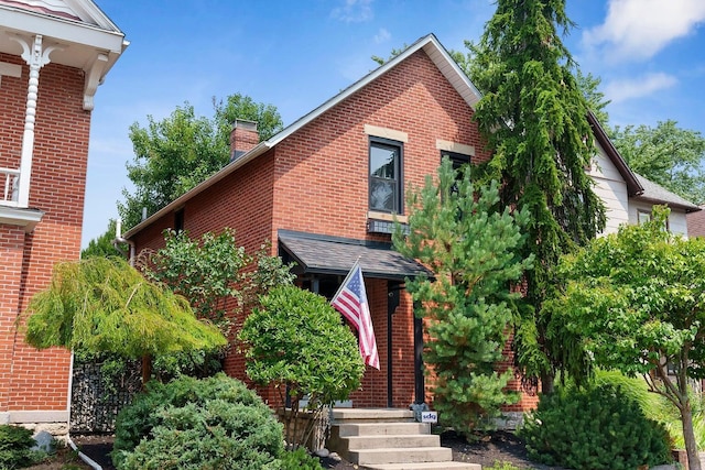420 Stanley Ave, Columbus, OH 43206 - view of front of home featuring brick siding and a chimney