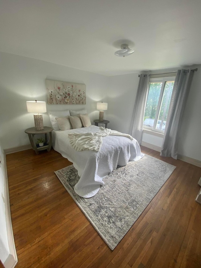 1431 S Ohio Ave, Columbus, OH 43206 - bedroom featuring baseboards and wood finished floors