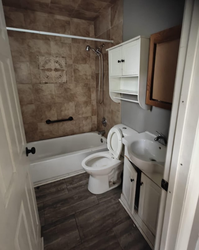 2108 Paul Dr, Columbus, OH 43211 - full bathroom featuring vanity, shower / bathtub combination, and toilet
