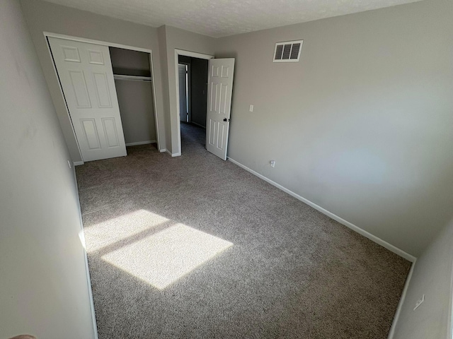 5464 Aspen Rd, Columbus, OH 43229 - unfurnished bedroom with carpet, a closet, and baseboards