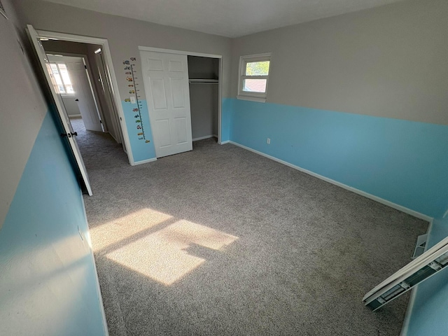 5464 Aspen Rd, Columbus, OH 43229 - unfurnished bedroom featuring carpet, a closet, and baseboards
