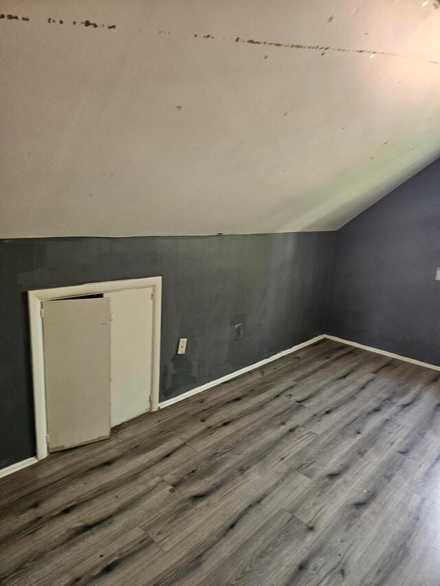 271 Carilla Ln, Columbus, OH 43228 - bonus room with vaulted ceiling, wood finished floors, and baseboards