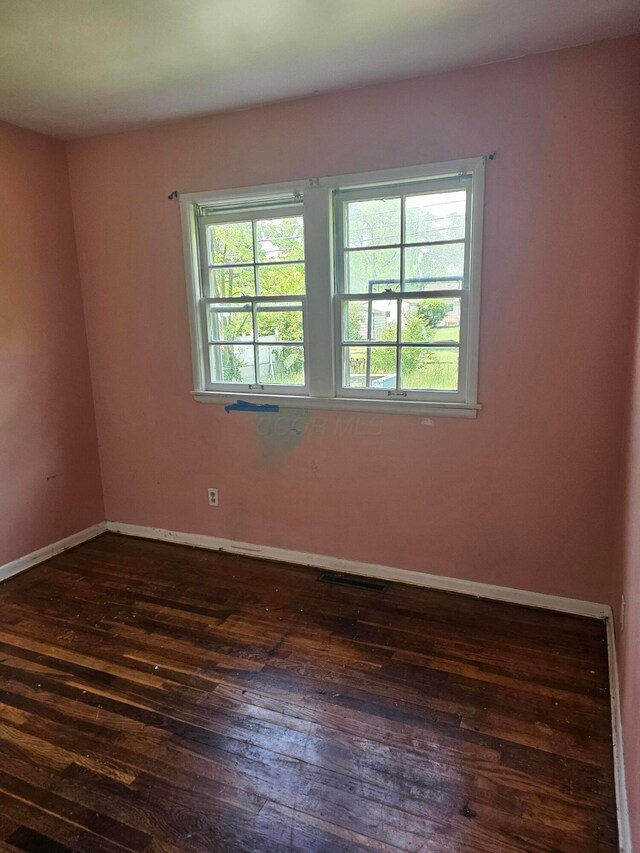 271 Carilla Ln, Columbus, OH 43228 - spare room with hardwood / wood-style floors, healthy amount of natural light, and baseboards