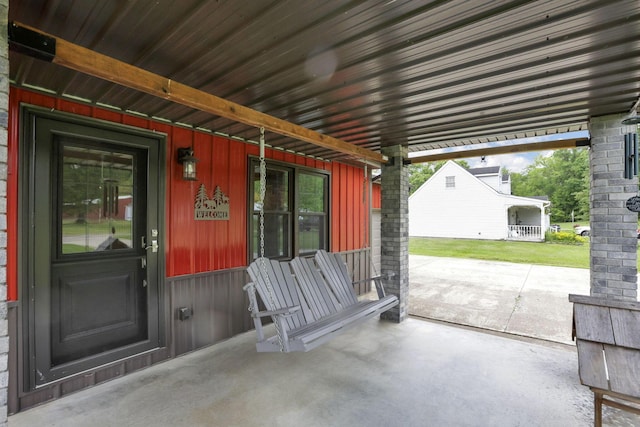 14609 Hock Hocking Rd, Logan, OH 43138 - property entrance with board and batten siding and a porch