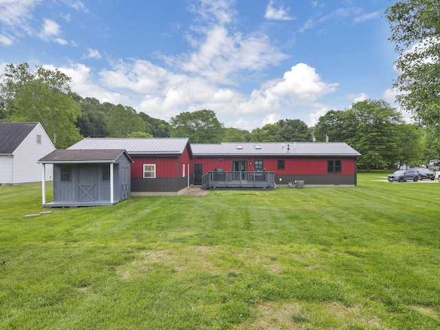 14609 Hock Hocking Rd, Logan, OH 43138 - back of house featuring a deck and a yard
