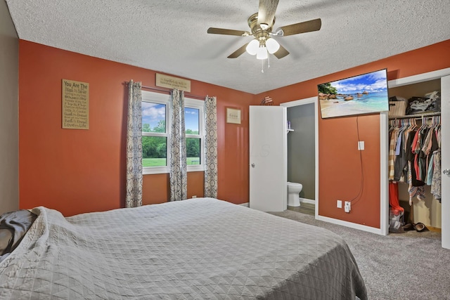 14609 Hock Hocking Rd, Logan, OH 43138 - bedroom featuring a textured ceiling, carpet, a closet, baseboards, and ensuite bath
