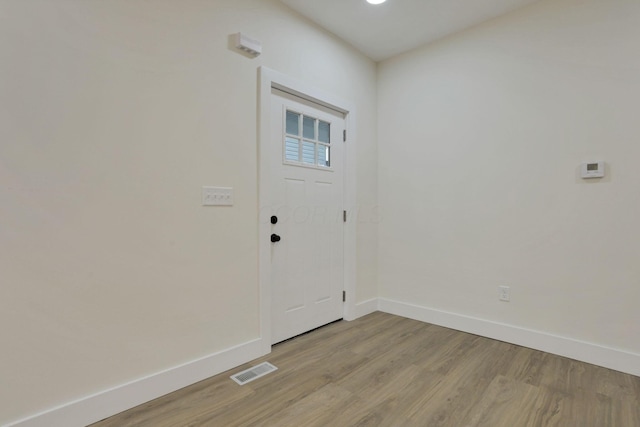1676 Parsons Ave, Columbus, OH 43207 - foyer featuring baseboards and light wood-style floors