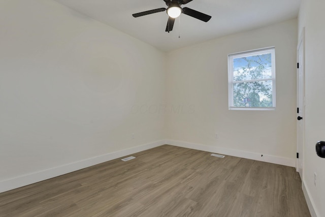 1676 Parsons Ave, Columbus, OH 43207 - empty room featuring baseboards, light wood-style floors, and a ceiling fan