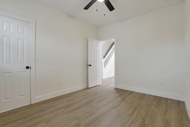 1676 Parsons Ave, Columbus, OH 43207 - empty room with ceiling fan, baseboards, and light wood-type flooring