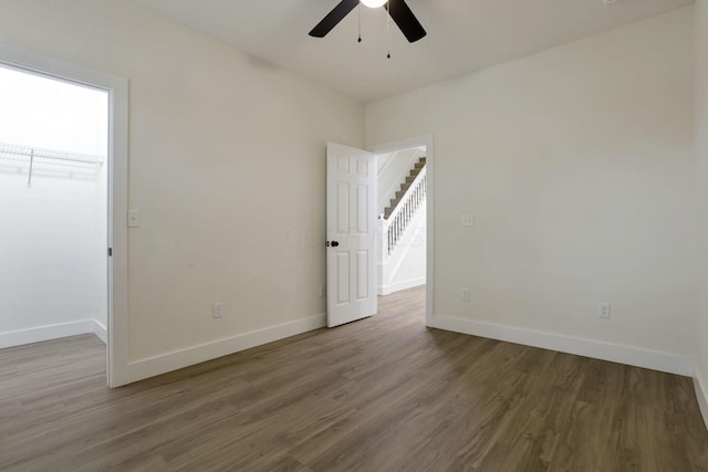 1676 Parsons Ave, Columbus, OH 43207 - spare room featuring ceiling fan, wood finished floors, and baseboards