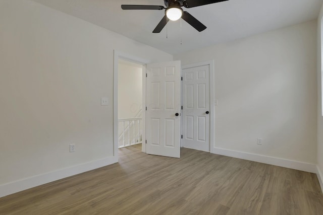 1676 Parsons Ave, Columbus, OH 43207 - spare room with baseboards, light wood finished floors, and a ceiling fan