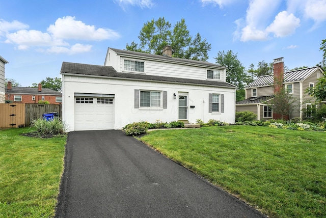2079 Inchcliff Rd, Upper Arlington, OH 43221 - traditional-style home with a garage, stucco siding, a chimney, driveway, and a shingled roof