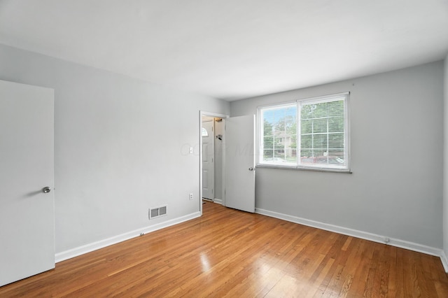 2079 Inchcliff Rd, Upper Arlington, OH 43221 - unfurnished bedroom featuring wood finished floors and baseboards