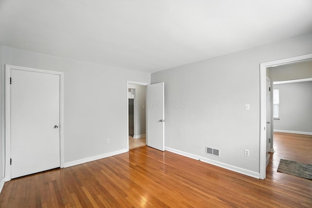2079 Inchcliff Rd, Upper Arlington, OH 43221 - unfurnished bedroom featuring wood finished floors and baseboards