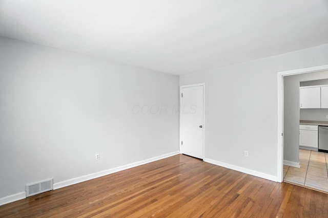 2079 Inchcliff Rd, Upper Arlington, OH 43221 - unfurnished bedroom featuring light wood-type flooring and baseboards