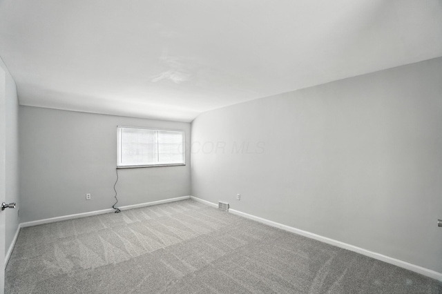 2079 Inchcliff Rd, Upper Arlington, OH 43221 - spare room featuring carpet and baseboards