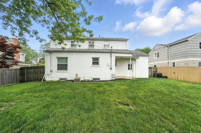 2079 Inchcliff Rd, Upper Arlington, OH 43221 - back of property with a fenced backyard, stucco siding, and roof with shingles