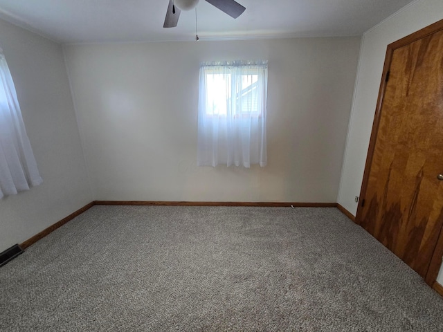 405 E 5th St, West Lafayette, OH 43845 - spare room with carpet, a ceiling fan, and baseboards