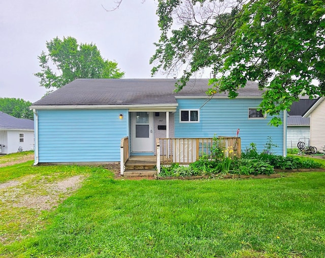 405 E 5th St, West Lafayette, OH 43845 - view of front of property featuring a front yard