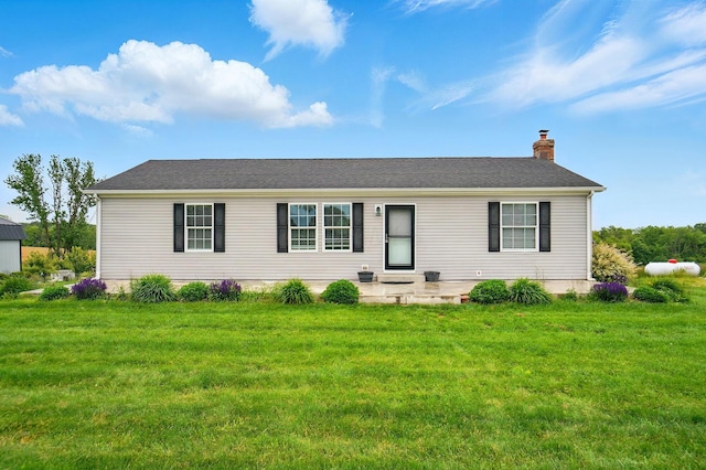 9842 State Route 757 NW, Somerset, OH 43783 - view of front of home with a chimney, a front lawn, and a shingled roof