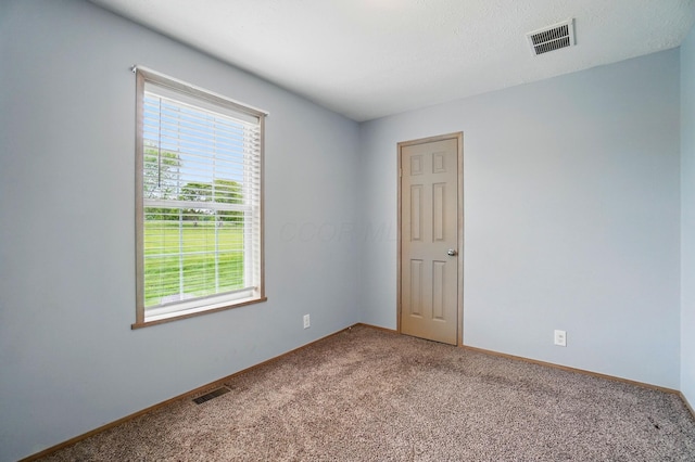 9842 State Route 757 NW, Somerset, OH 43783 - spare room featuring light colored carpet and baseboards