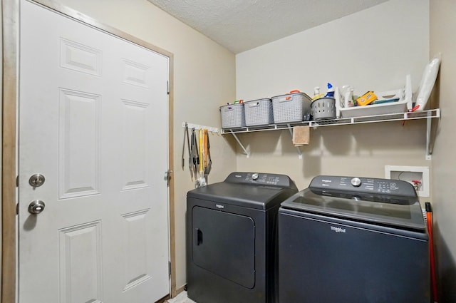 9842 State Route 757 NW, Somerset, OH 43783 - laundry room with washing machine and dryer and a textured ceiling