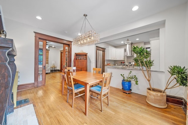 663 Wilson Ave, Columbus, OH 43205 - dining area featuring light wood-type flooring, recessed lighting, ceiling fan, and baseboards