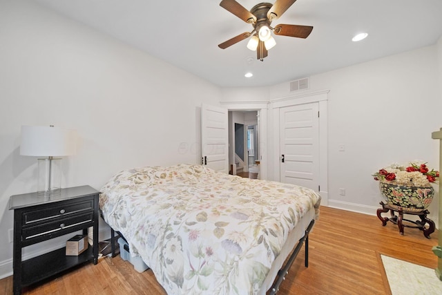 663 Wilson Ave, Columbus, OH 43205 - bedroom with light wood-style floors, baseboards, a closet, recessed lighting, and a ceiling fan