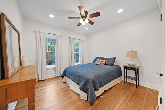 663 Wilson Ave, Columbus, OH 43205 - bedroom with light wood-style floors, baseboards, ceiling fan, and recessed lighting