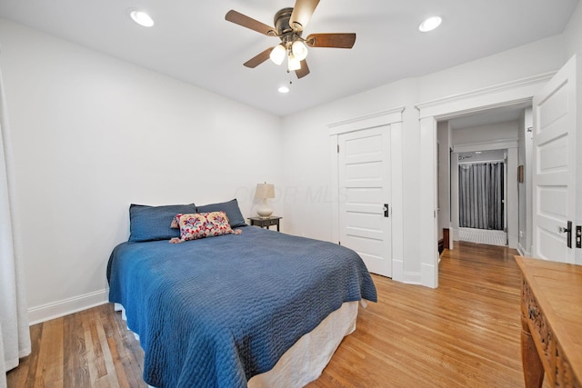 663 Wilson Ave, Columbus, OH 43205 - bedroom featuring baseboards, light wood-type flooring, ceiling fan, a closet, and recessed lighting