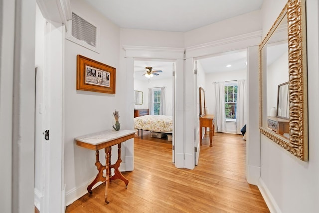 663 Wilson Ave, Columbus, OH 43205 - corridor featuring light wood finished floors and baseboards