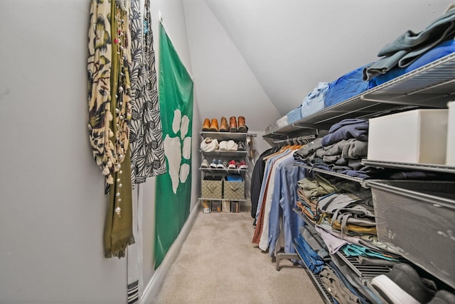 663 Wilson Ave, Columbus, OH 43205 - walk in closet featuring carpet floors and lofted ceiling