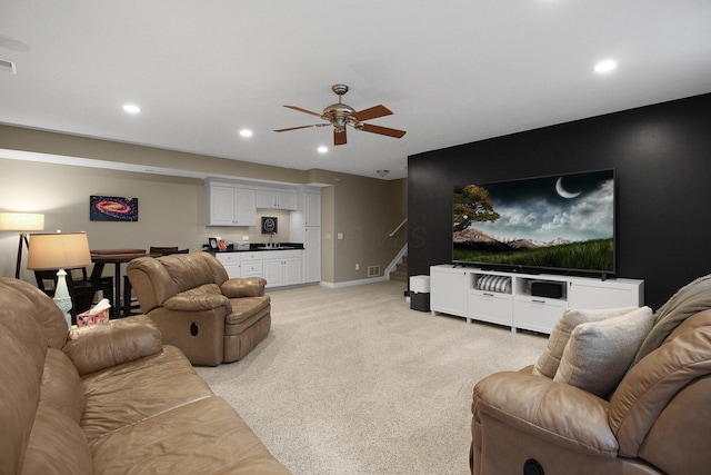 7313 Bromfield Dr, Canal Winchester, OH 43110 - living room featuring baseboards, light carpet, ceiling fan, recessed lighting, and stairway