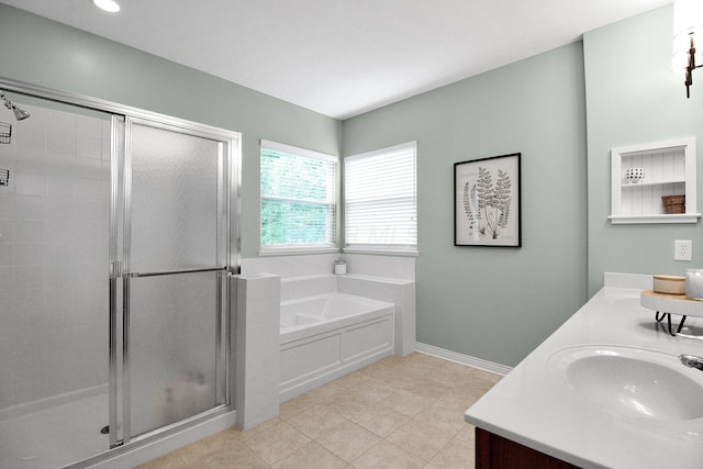 7313 Bromfield Dr, Canal Winchester, OH 43110 - full bathroom featuring a stall shower, a garden tub, and double vanity