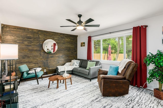 4351 Broadhurst Dr, Columbus, OH 43213 - living area with ceiling fan and wooden walls