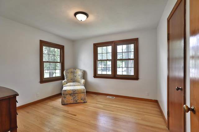 2009 Zollinger Rd, Columbus, OH 43221 - living area with light wood-style flooring and baseboards