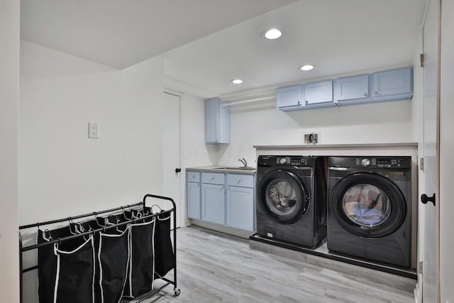 2009 Zollinger Rd, Columbus, OH 43221 - laundry area with separate washer and dryer, cabinet space, light wood-style flooring, and recessed lighting