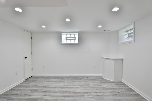 2009 Zollinger Rd, Columbus, OH 43221 - below grade area with recessed lighting, light wood-type flooring, and baseboards