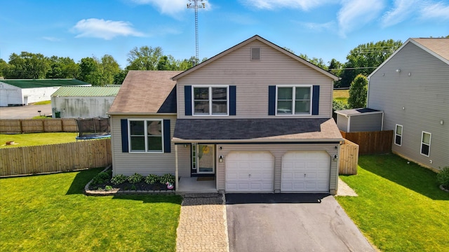 1627 Metcalfe Ave, Columbus, OH 43207 - split level home featuring driveway, an attached garage, a trampoline, and a shingled roof