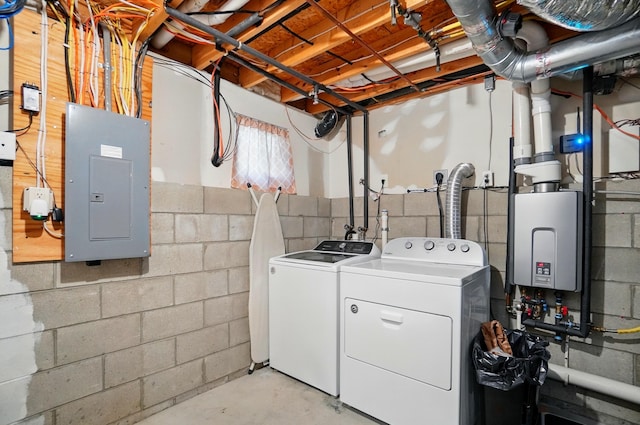 1627 Metcalfe Ave, Columbus, OH 43207 - laundry room with electric panel, washer and clothes dryer, and concrete block wall