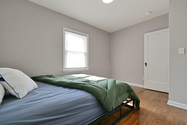 2567 Joyce Ave, Columbus, OH 43211 - bedroom with wood finished floors and baseboards