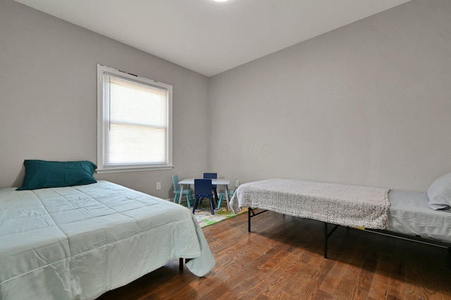 2567 Joyce Ave, Columbus, OH 43211 - bedroom with dark wood-style flooring