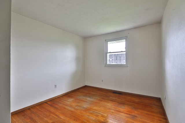 1390 E Dublin Granville Rd, Columbus, OH 43229 - unfurnished room with light wood finished floors and baseboards