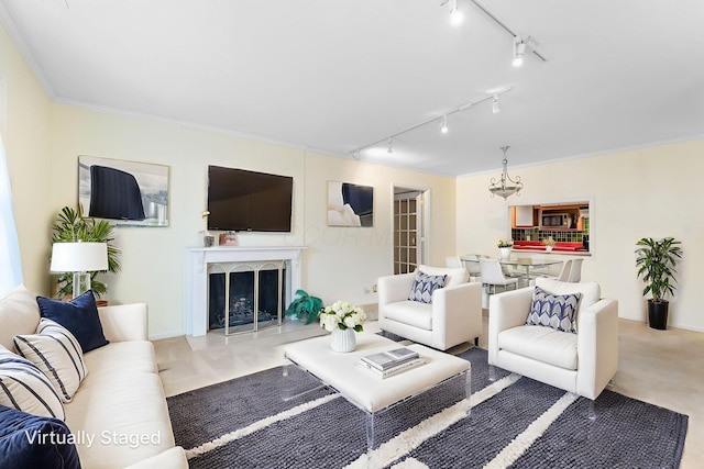 1631 Roxbury Rd Unit D2, Columbus, OH 43212 - living room with track lighting, a high end fireplace, and crown molding