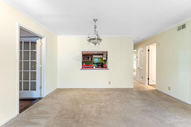 1631 Roxbury Rd Unit D2, Columbus, OH 43212 - spare room featuring ornamental molding and carpet floors
