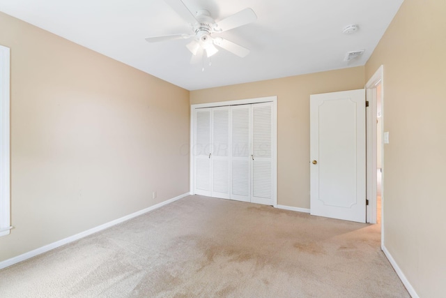 1631 Roxbury Rd Unit D2, Columbus, OH 43212 - unfurnished bedroom featuring light colored carpet, a closet, and ceiling fan