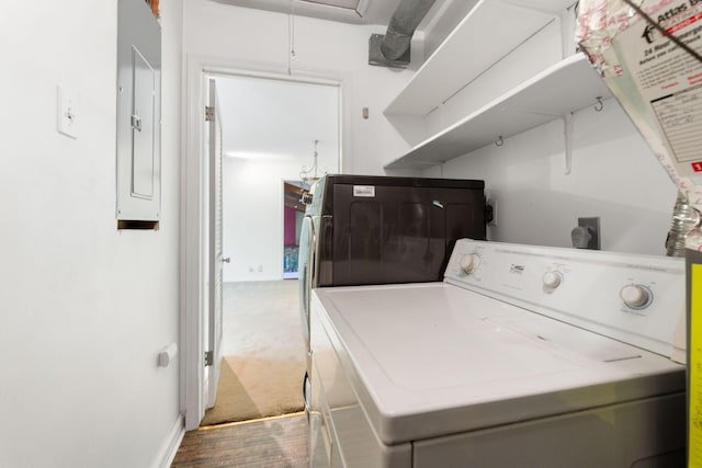 1631 Roxbury Rd Unit D2, Columbus, OH 43212 - laundry room with washer and clothes dryer, electric panel, attic access, and wood finished floors