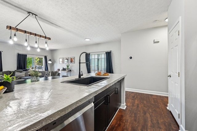 4006 Darby Park Rd, Hilliard, OH 43026 - kitchen with a sink, open floor plan, a textured ceiling, stainless steel dishwasher, and dark wood-style floors