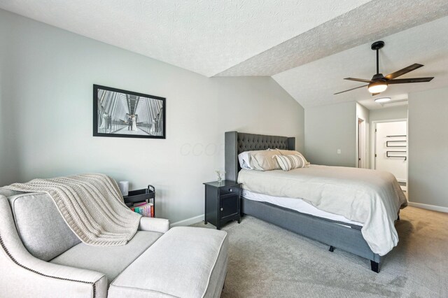 4006 Darby Park Rd, Hilliard, OH 43026 - carpeted bedroom with vaulted ceiling, baseboards, a textured ceiling, and a ceiling fan